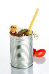 Image showing bloody mary cocktail in the iron circle on a white background