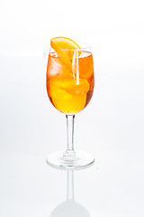 Image showing Amber cocktail in a glass isolated on white background