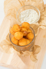 Image showing Breaded potato balls with sauce