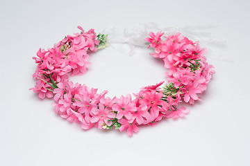 Image showing tiara of artificial  roses on a light background