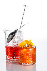 Image showing Amber cocktail in a glass isolated on white background