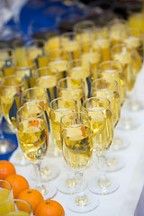 Image showing Glasses with champagne on the party table. lot of alcohol