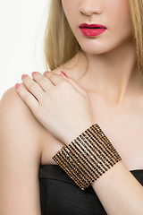 Image showing hands close-up of a young girl with bracelet