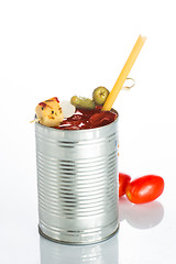 Image showing bloody mary cocktail in the iron circle on a white background