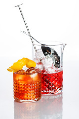 Image showing Amber cocktail in a glass isolated on white background