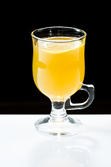 Image showing mulled wine. fruit or berry drink. alcohol winter. against a dark background