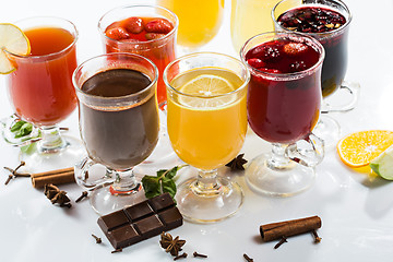 Image showing mulled wine. fruit or berry drink. alcohol winter. against a bright background