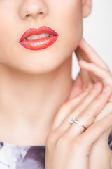 Image showing Red Sexy Lips and Nails closeup. Open Mouth. Manicure and Makeup. Make up concept. 