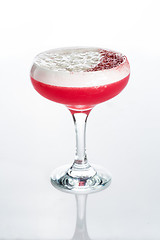 Image showing Pink cocktail decorated with marshmallow isolated on white background