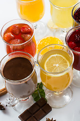 Image showing mulled wine. fruit or berry drink. alcohol winter. against a bright background