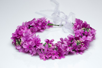 Image showing tiara of artificial  roses on a light background