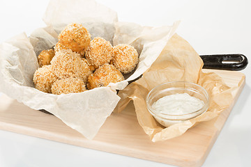 Image showing Breaded potato balls with sauce