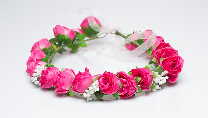 Image showing tiara of artificial  roses on a light background