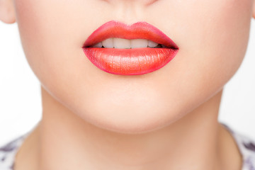 Image showing Red Sexy Lips and Nails closeup. Open Mouth. Manicure and Makeup. Make up concept. 