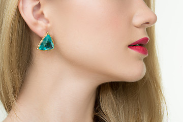 Image showing close up of woman wearing shiny diamond earrings