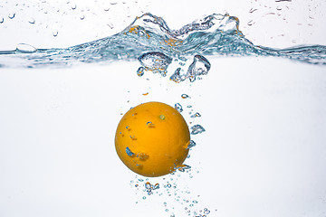 Image showing orange splash in water 