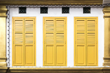 Image showing yellow window doors