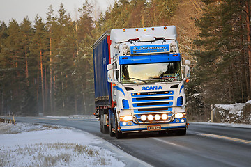 Image showing Colorful Scania Semi Truck on Winter Road