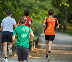 Image showing Boys running in park