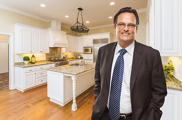 Image showing Man Wearing Necktie in Beautiful Custom Residential Kitchen