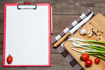 Image showing Open blank recipe book on brown wooden background