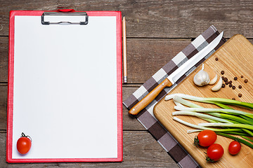 Image showing Open blank recipe book on brown wooden background