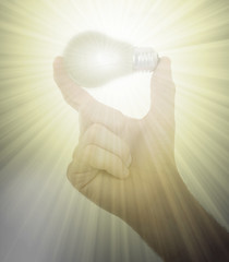 Image showing Hand holding an light bulb 