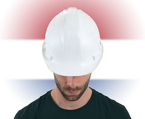 Image showing Engineer with flag on background - Netherlands