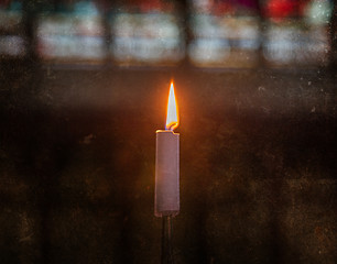 Image showing Candle burning in church - Vintage dirty look