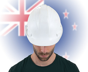 Image showing Engineer with flag on background - New Zealand