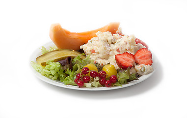 Image showing Snack time - View of Russian salad on a white plate