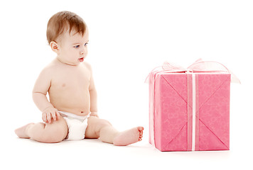 Image showing baby boy in diaper with big gift box