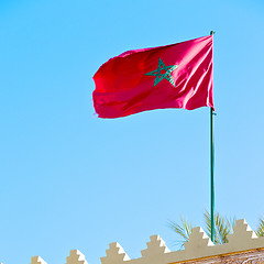 Image showing tunisia  waving flag in the blue sky  colour and battlements  wa