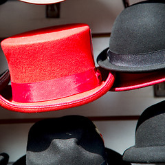 Image showing in london old red hat and black  the  fashion shop