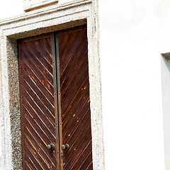 Image showing detail in  wall door  italy land europe architecture and wood th