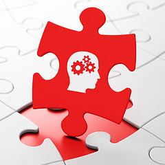 Image showing Advertising concept: Head With Gears on puzzle background
