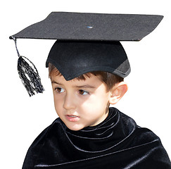 Image showing Cute kid graduate with graduation cap