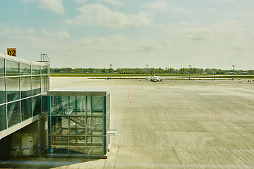 Image showing Airplane at the terminal gate ready for takeoff 