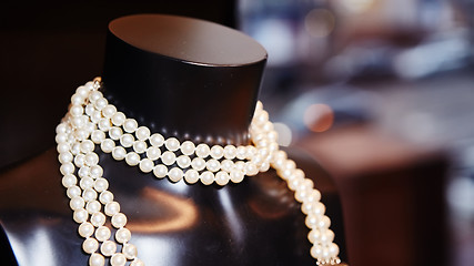 Image showing Pearl necklace on black mannequin 