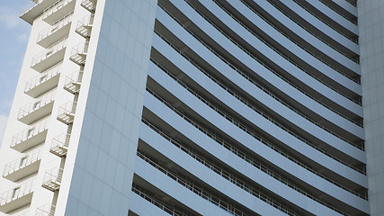 Image showing angle view to textured background of modern glass building 