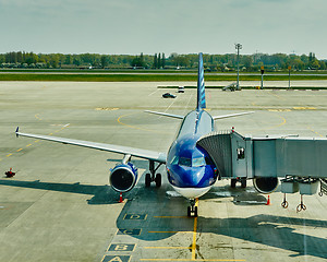 Image showing Airplane at the terminal gate ready for takeoff 