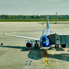 Image showing Airplane at the terminal gate ready for takeoff 