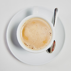 Image showing cup of fresh espresso on table,