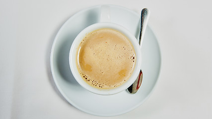 Image showing cup of fresh espresso on table,