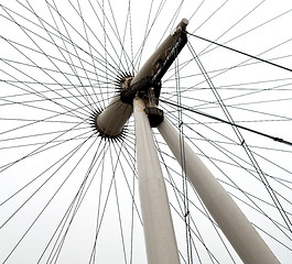 Image showing london eye in the spring sky and white clouds