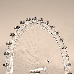 Image showing london eye in the spring sky and white clouds