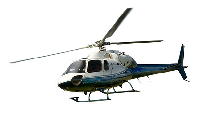 Image showing Helicopter in flight isolated against white