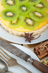 Image showing kiwi  pie tart and spices