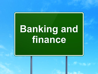 Image showing Currency concept: Banking And Finance on road sign background