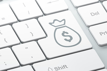 Image showing Currency concept: Money Bag on computer keyboard background